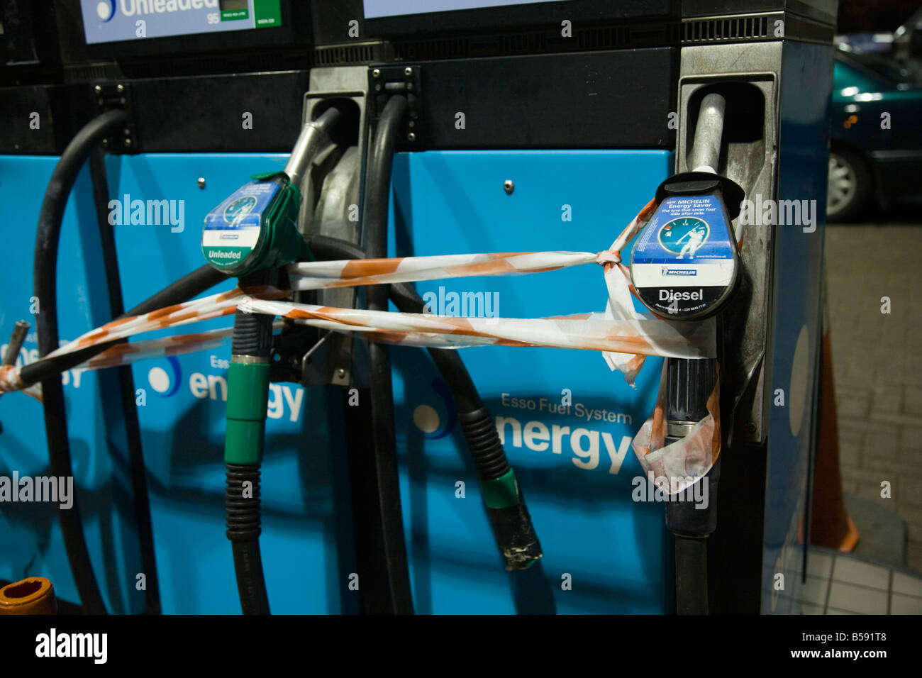 Nozzles at empty petrol and diesel pump at service station on the M40 motorway. (42) Stock Photo