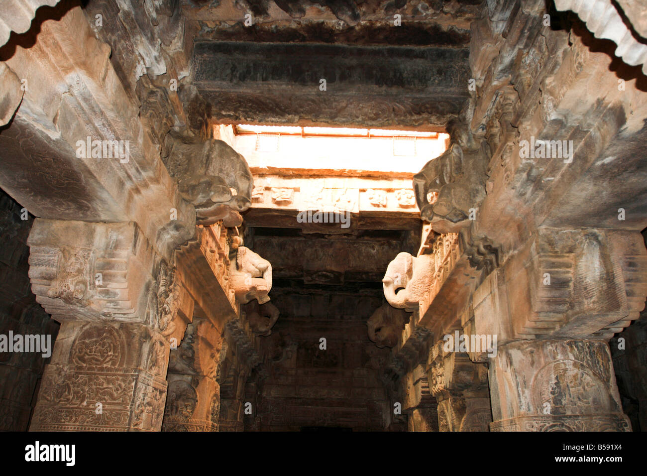 Decorations at the pillars and ceiling of a hindu temple dedicated to Shiva at the ancient site of Pattadakal Karnataka India Stock Photo