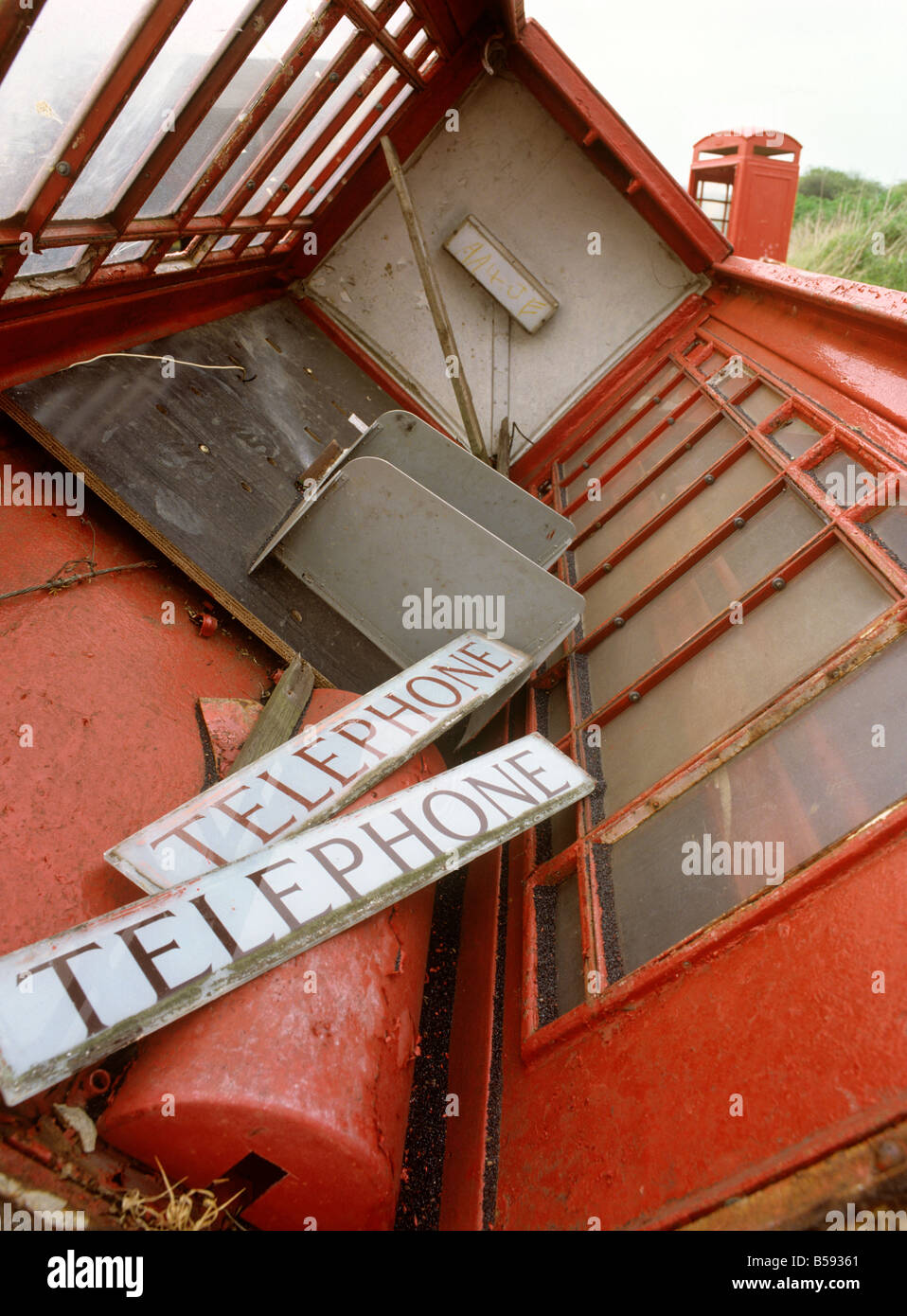 UK England Essex inside redundant Fyfield K6 Phone boxawaiting sale in field Stock Photo