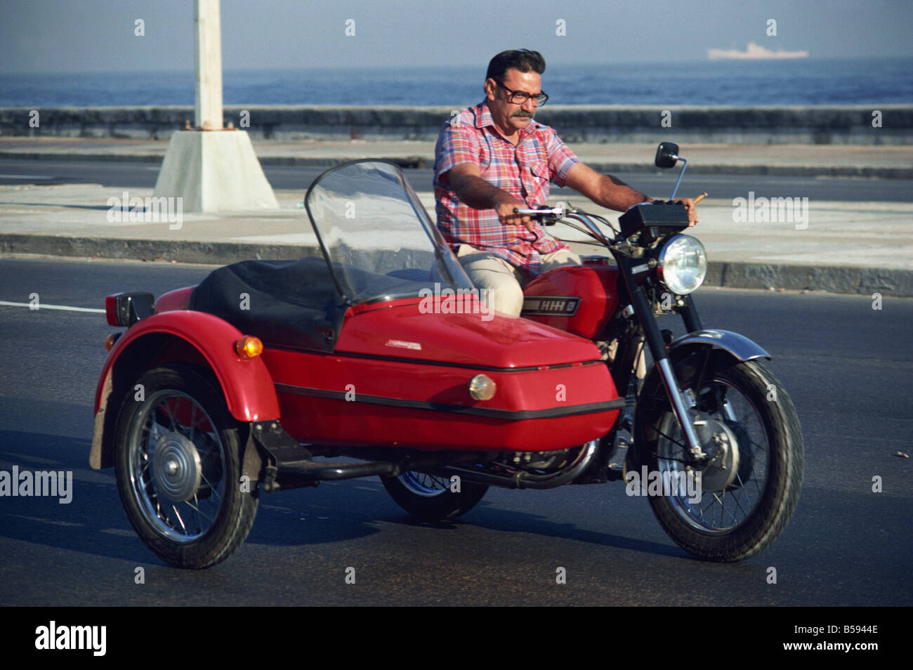 A Russian motorbike and sidecar in Havana Cuba West Indies L Taylor Stock Photo