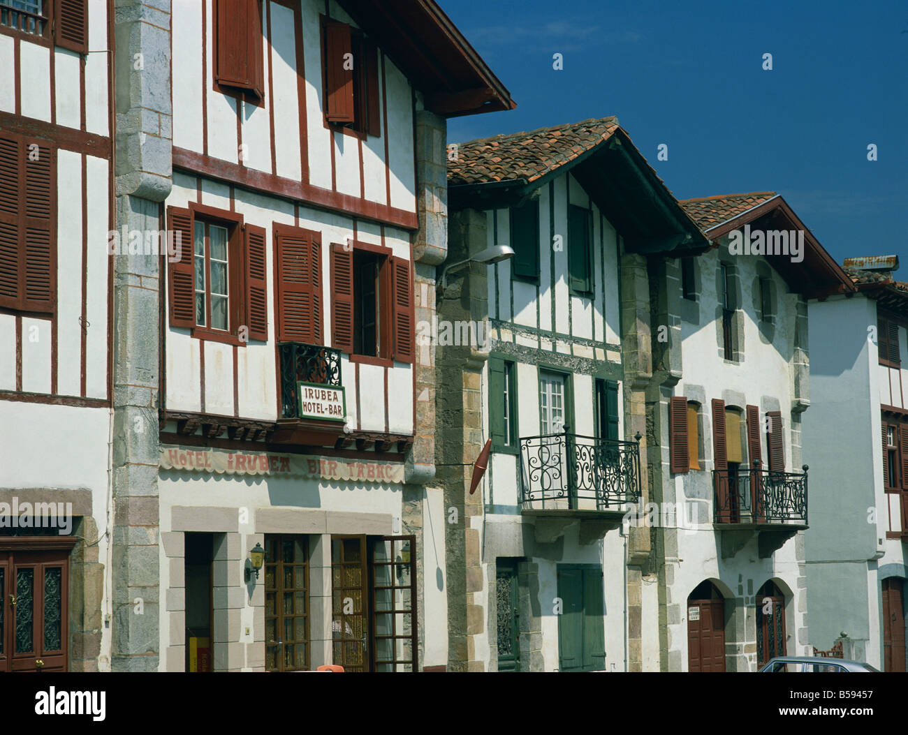 A row of traditional buildings including a small hotel in the village of Ainhoa in the Pyrenees in Aquitaine France M Busselle Stock Photo