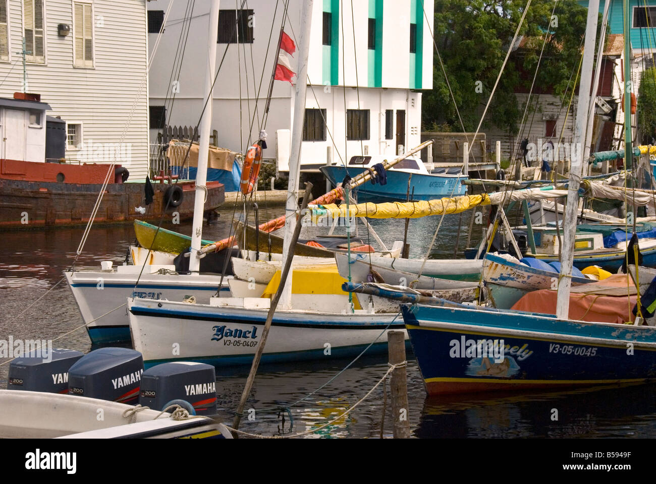 Belize City docks sailing ships sailboats city skyline cruise ship