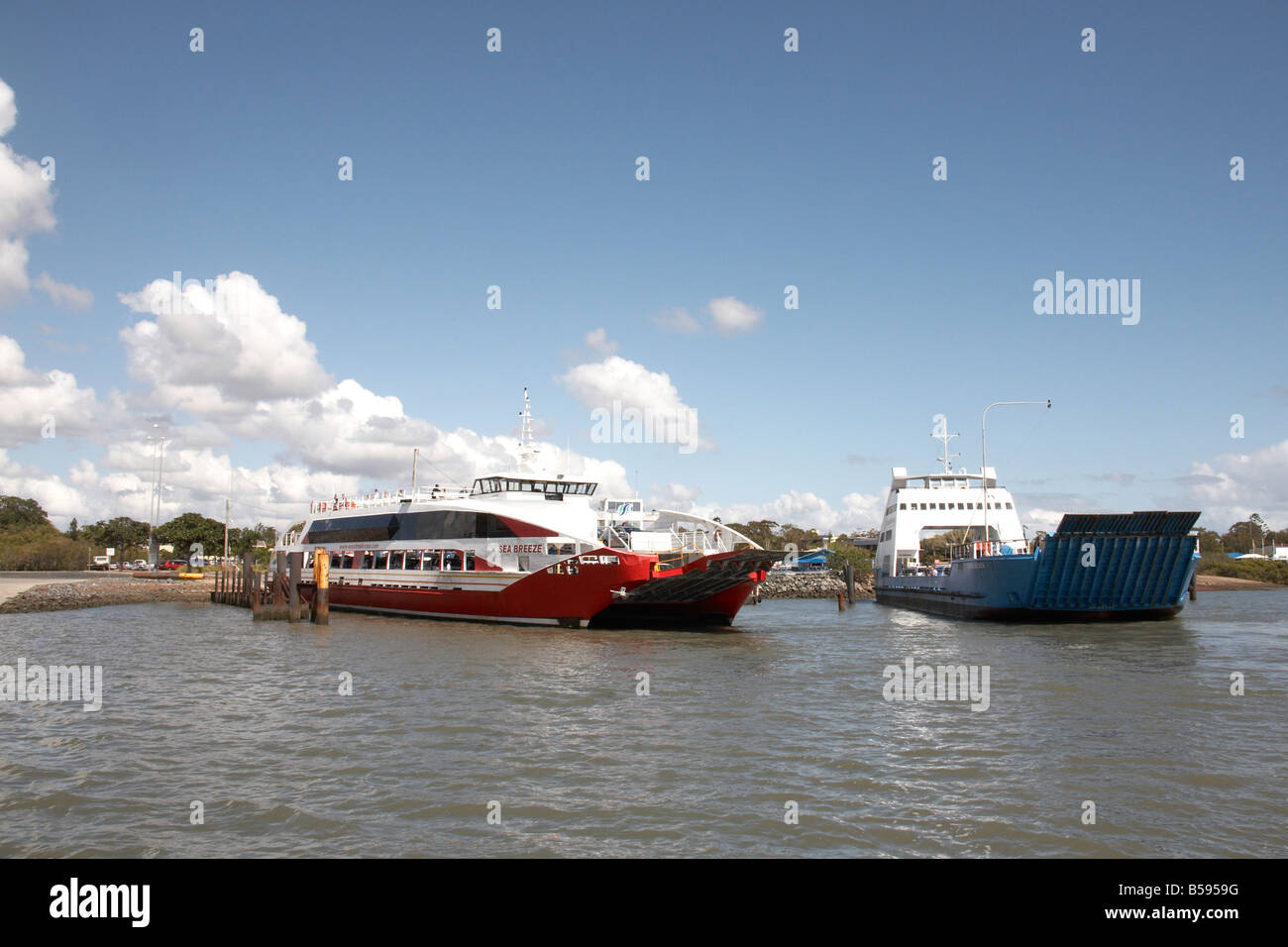 Ferries in port departing Cleveland ferry terminal for North Stradbrook Island in Brisbane Queensland QLD Australia Stock Photo