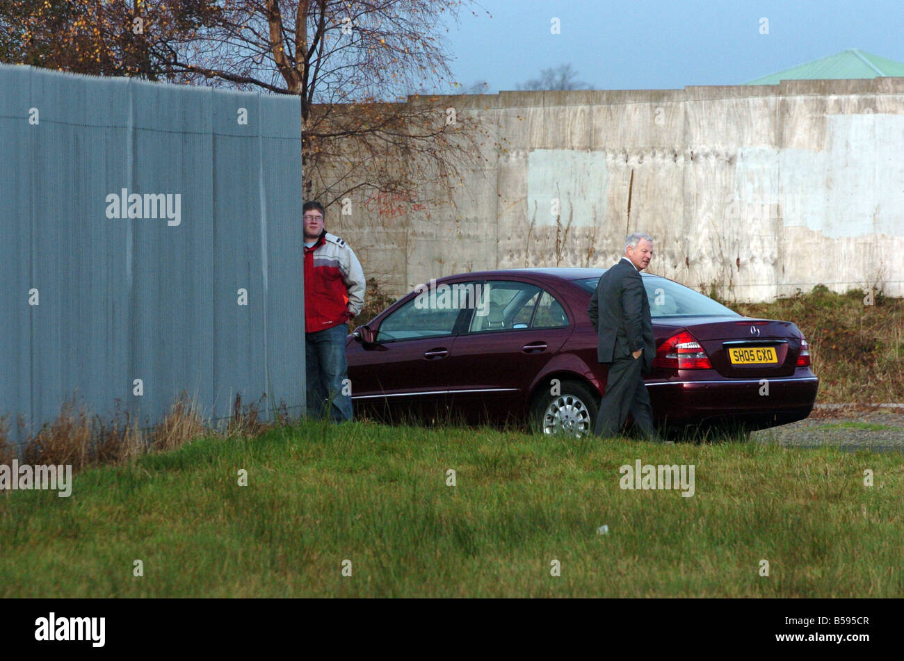 Mystery Spy at Scotland training camp November 2007 A shady man seen spying on the closed door Scotland training camp at Dumbarton ahead of the crucial game against Italy The man tried to hide his face and was later revealed to be an from Italy Pic shows the suspicious Italian s limo Stock Photo