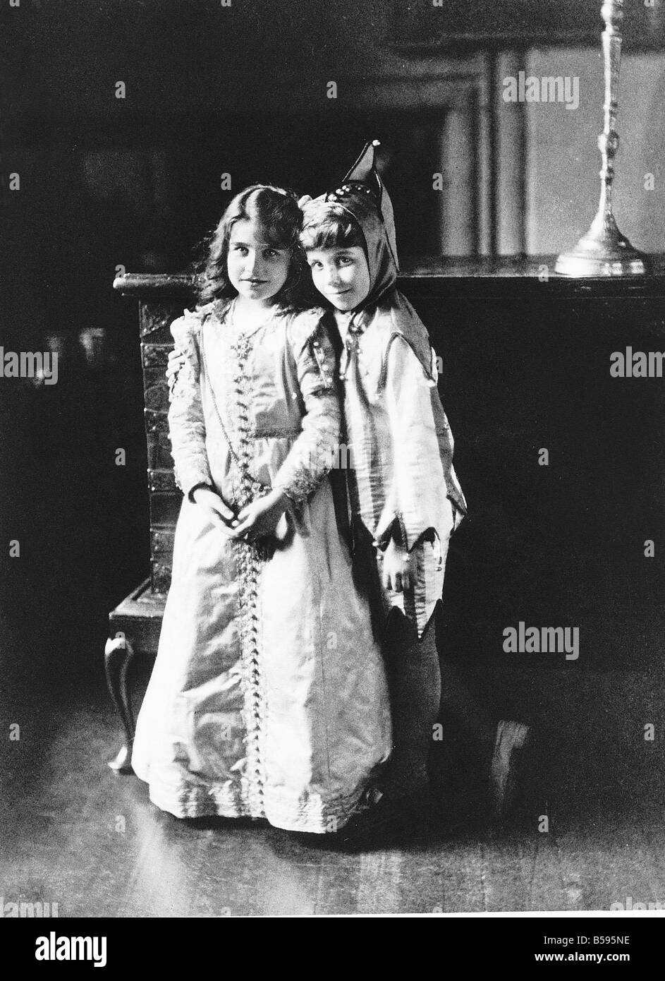 The young Lady Elizabeth Bowes Lyon aged 9 with brother David at Glamis Castle Scotland in 1909 David died but Elizabeth became Stock Photo