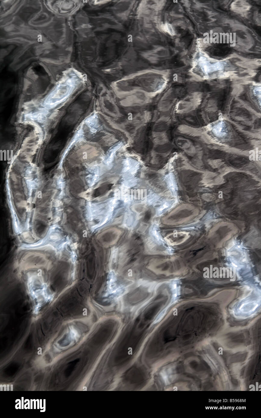 sun light reflection waves on lake water surface Stock Photo - Alamy