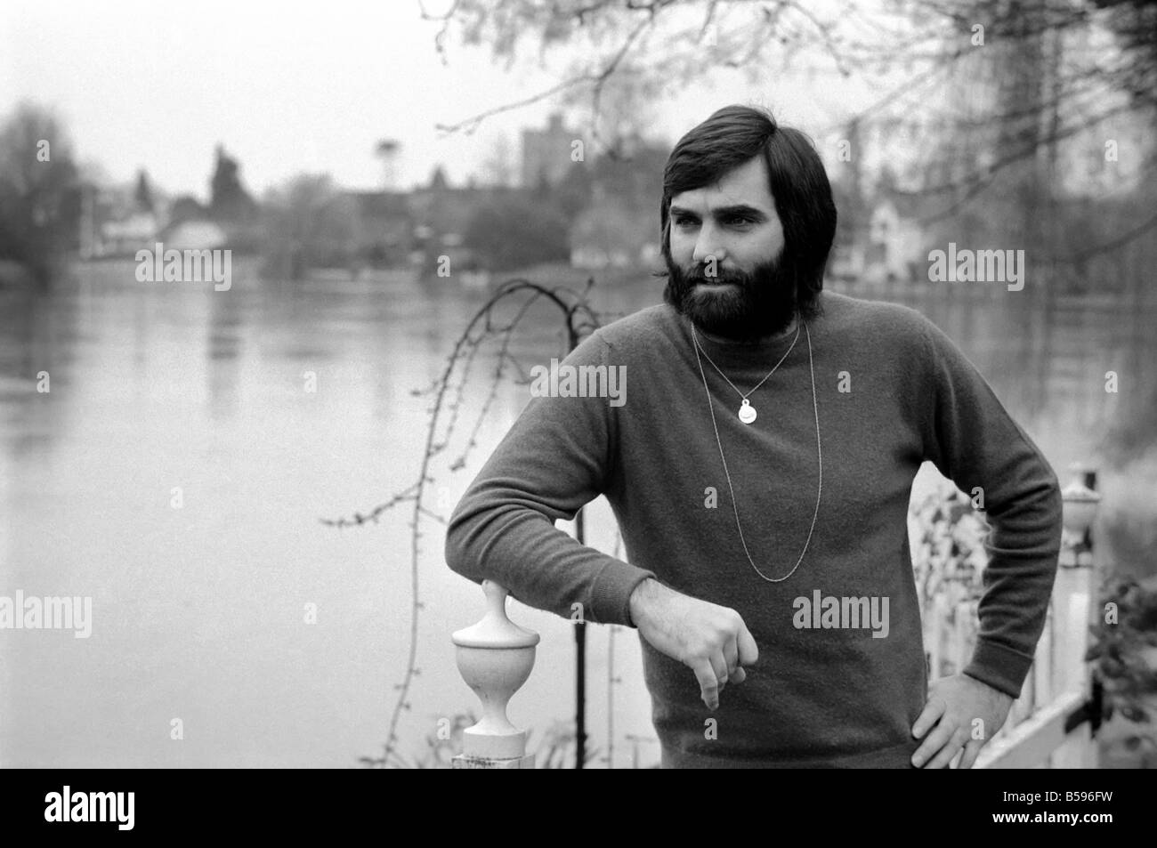 George Best. Footballer George Best at the Bray home of Michael "Parkinson," who has written a book on George. March 1975 Stock Photo