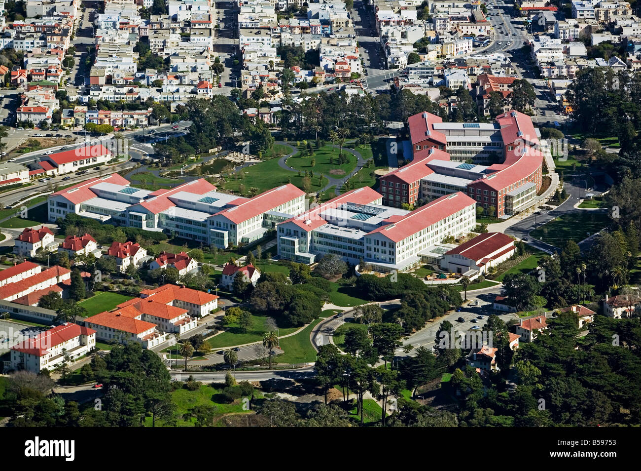 aerial above Lucasfilm Letterman Digital Arts Center Presidio San Francisco Palace of Fine Arts Marina district in background Stock Photo