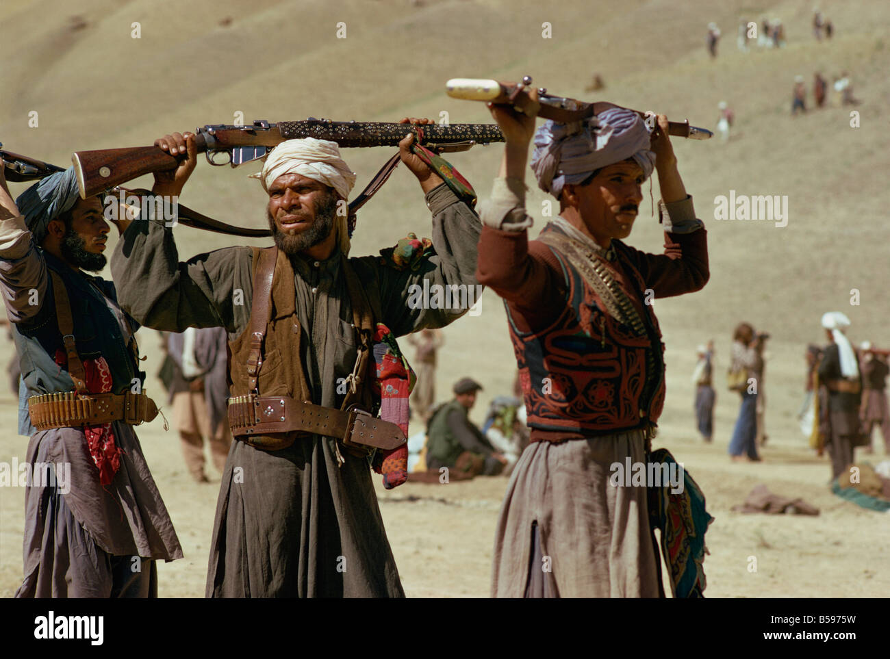 Pushtoon tribesmen dancing at Jeshan celebration, Bamiyan, Afghanistan Stock Photo