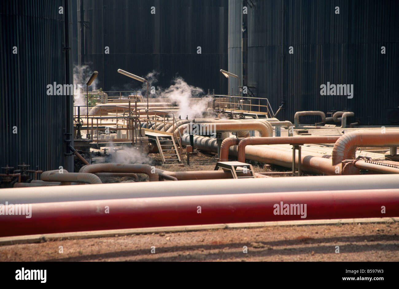 Storage tanks and piples in NNPC Nigerian National Petroleum Corporation oil refinery in Kaduna Nigeria Africa Stock Photo