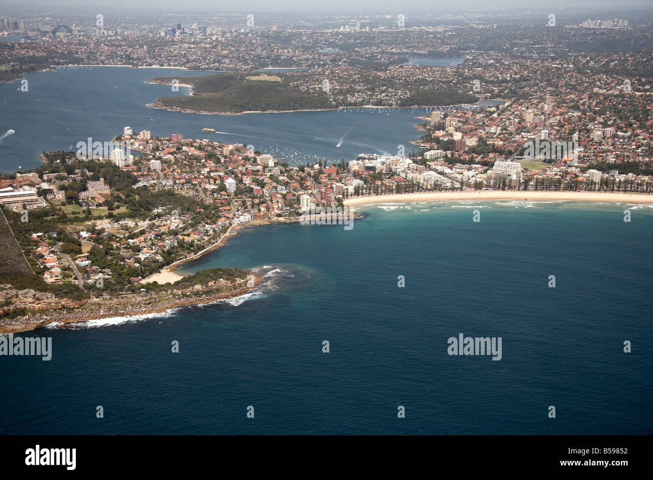 Aerial view west of suburban houses Manly North Steyne Beach Cabbage