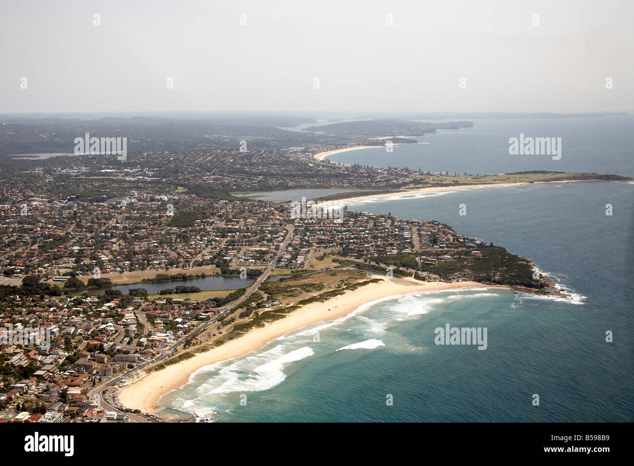 Aerial view north west of South North Curl Beach Dee Why Beach Lagoon suburban houses Carrington Parade Sydney NSW Australia Stock Photo