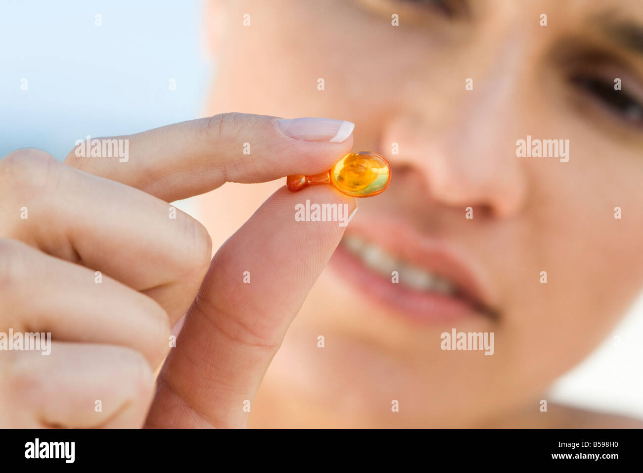 Sun tan vitamins wellness hi-res stock photography and images - Alamy