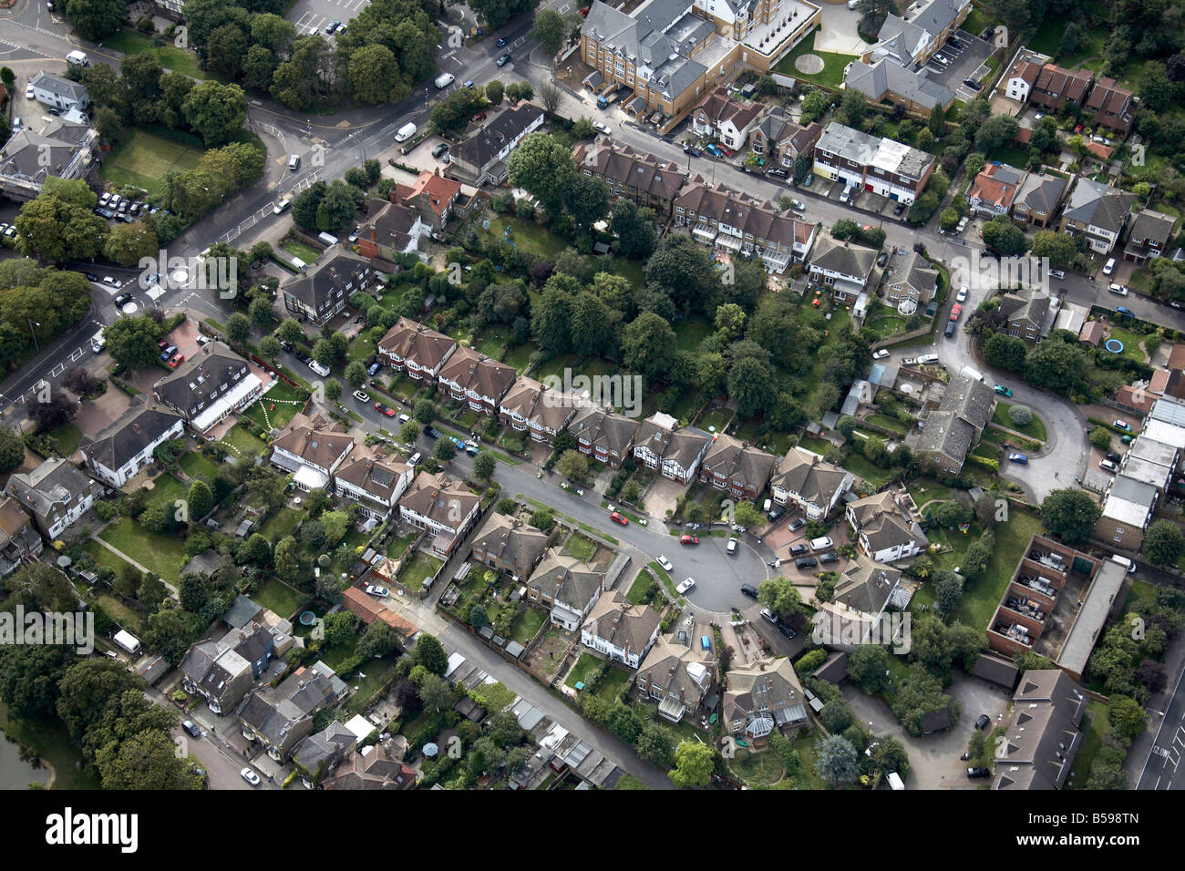 Aerial view south east of suburban houses Devon Close Stag Lane