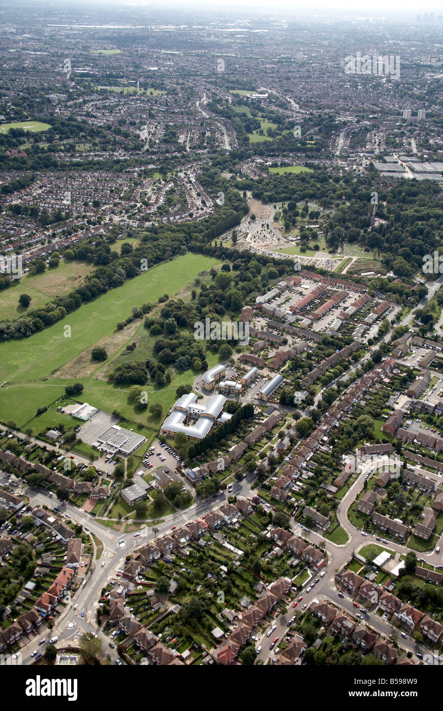 Aerial view south east of Brunswick Park Junior and Infant School New Southgate Cemetery and Crematorium suburban housing London Stock Photo