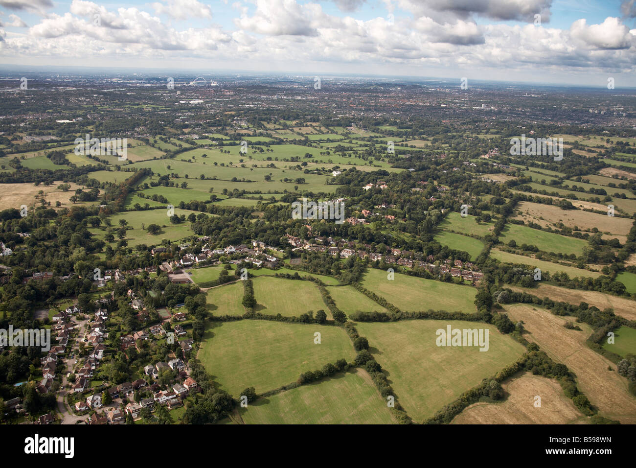 Aerial view south west of suburban houses fields trees Totteridge