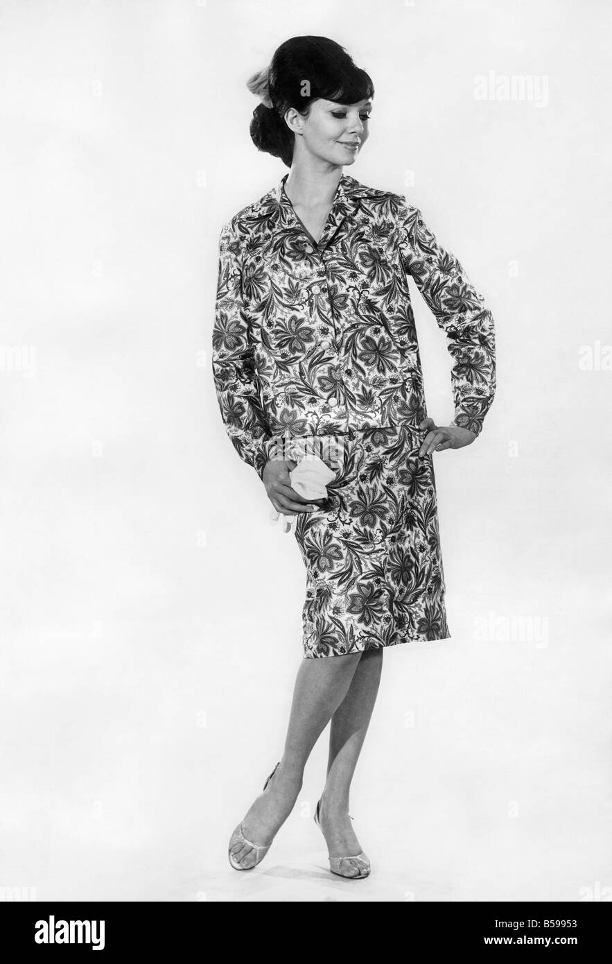 Reveille Fashions 1964. Meriel Weston modeling a floral twin set and