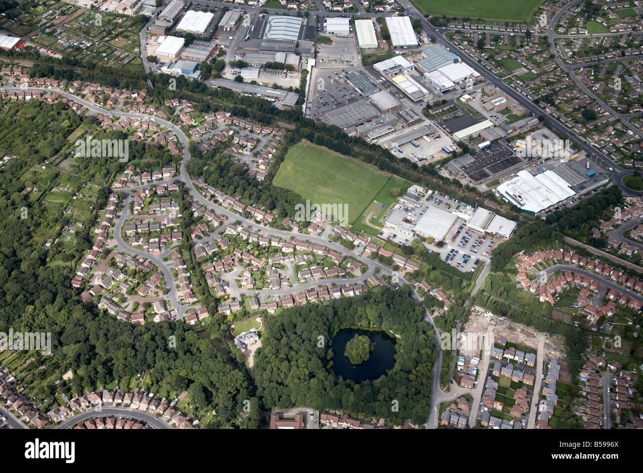 Aerial view north west of suburban houses allotments Lambourne Drive