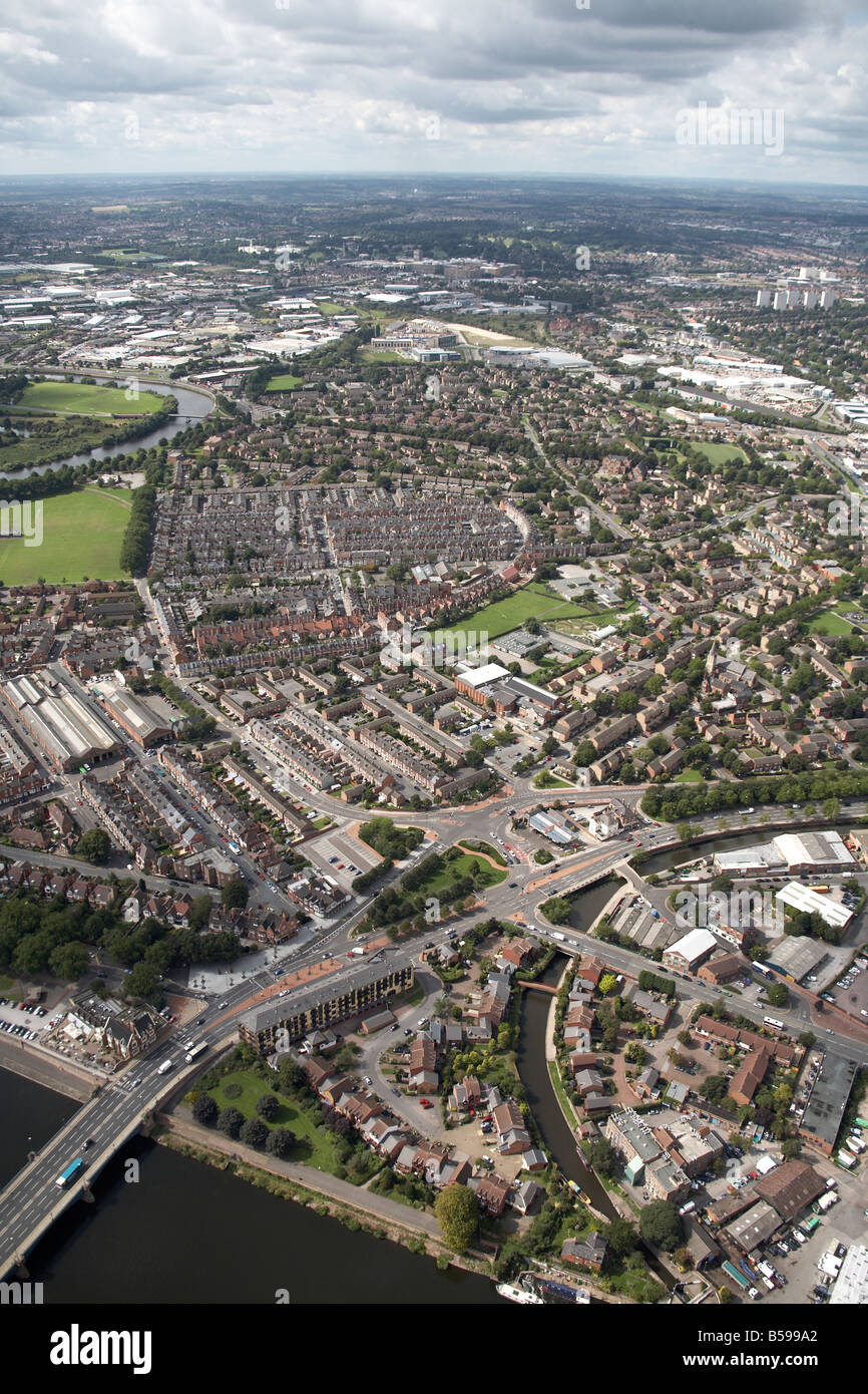 Aerial view west of The Trent River London Road Meadows Way suburban houses sports ground Nottingham NG2 England UK High level o Stock Photo
