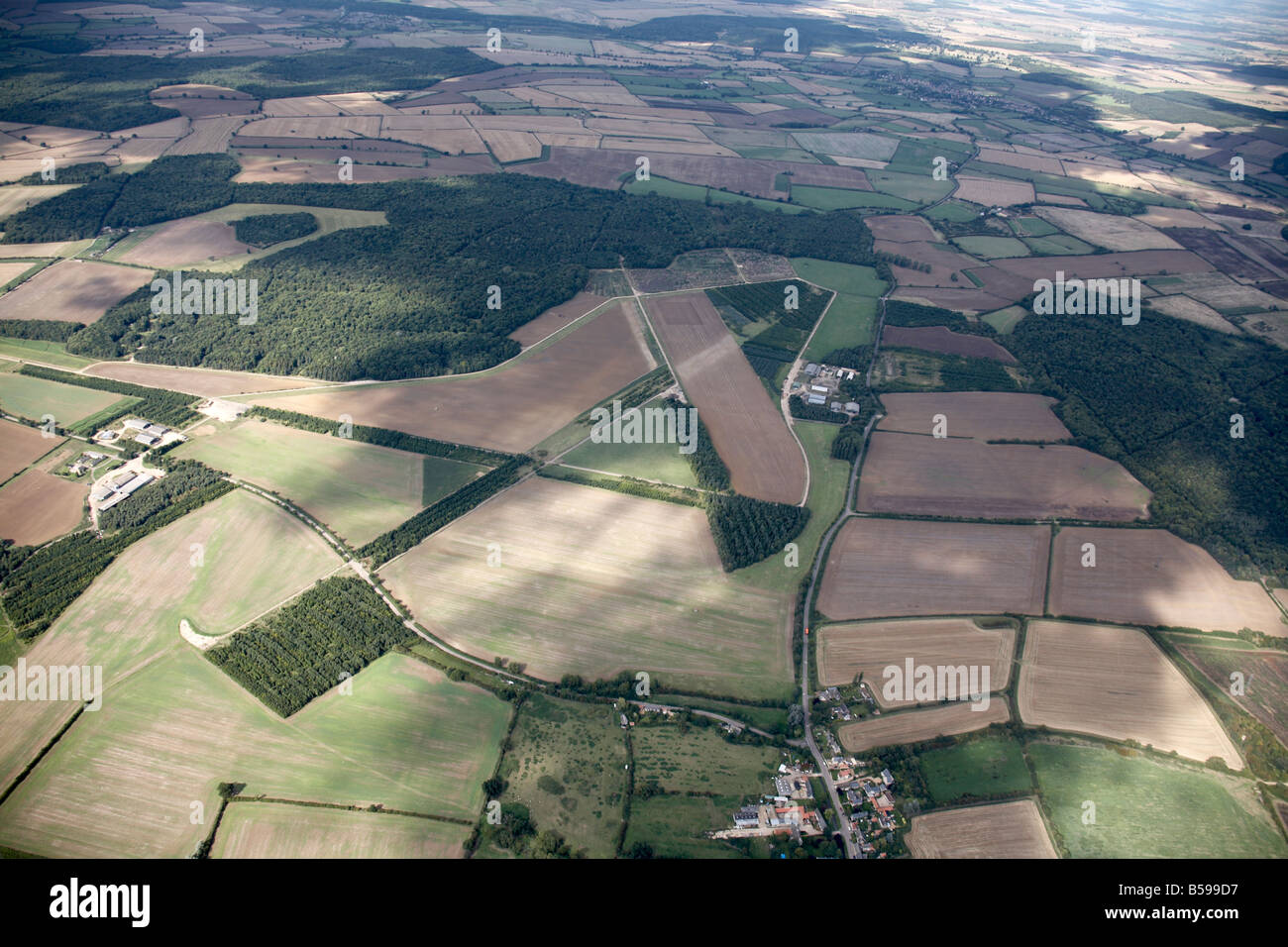Abstract aerial view north of a disused RAF Airfield country fields Grafton Underwood Northamptonshire England UK High level obl Stock Photo