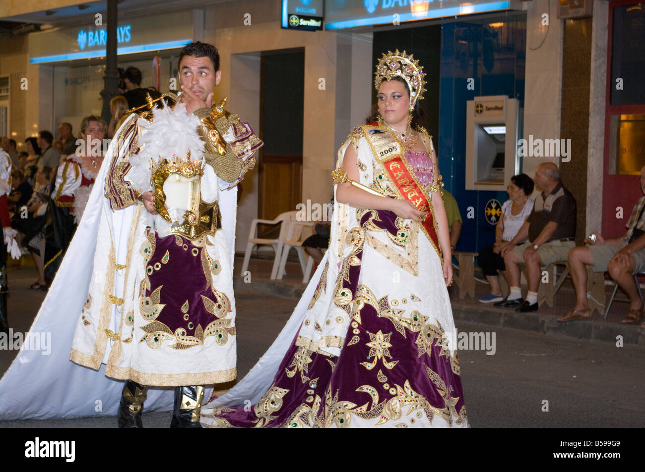 People Male and Female in Traditional Christian Costume at the Fiesta of Moors and Christians Guardamar Spain Spanish Fiestas Stock Photo