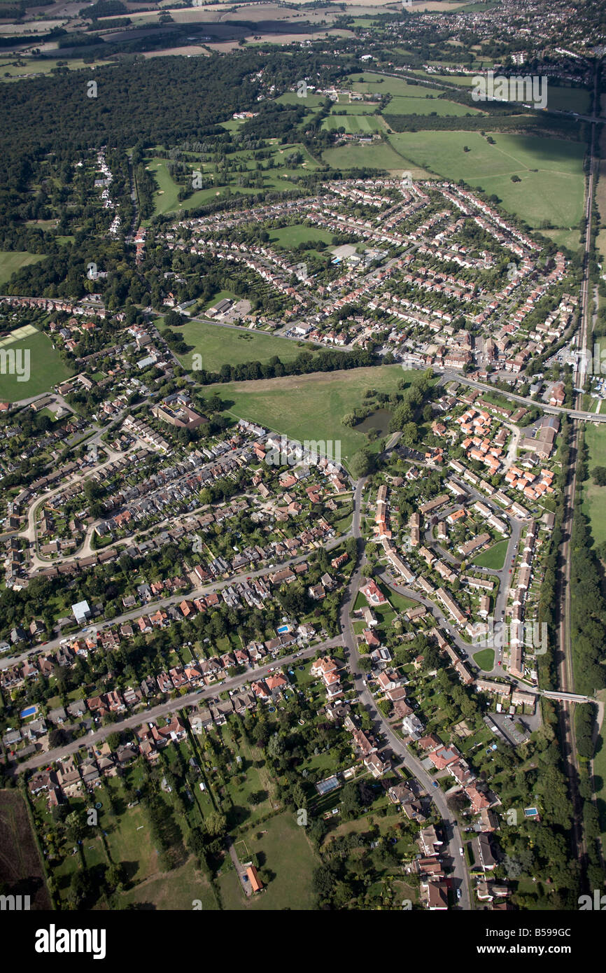 Aerial view north of suburban houses golf course railway line Coppice