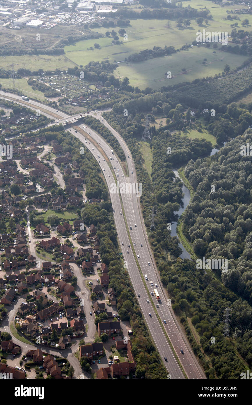Aerial view north west of London Road A3 Road Clay Lane River Wey Navigation N T Sutton Park suburban houses Guildford Surrey GU Stock Photo