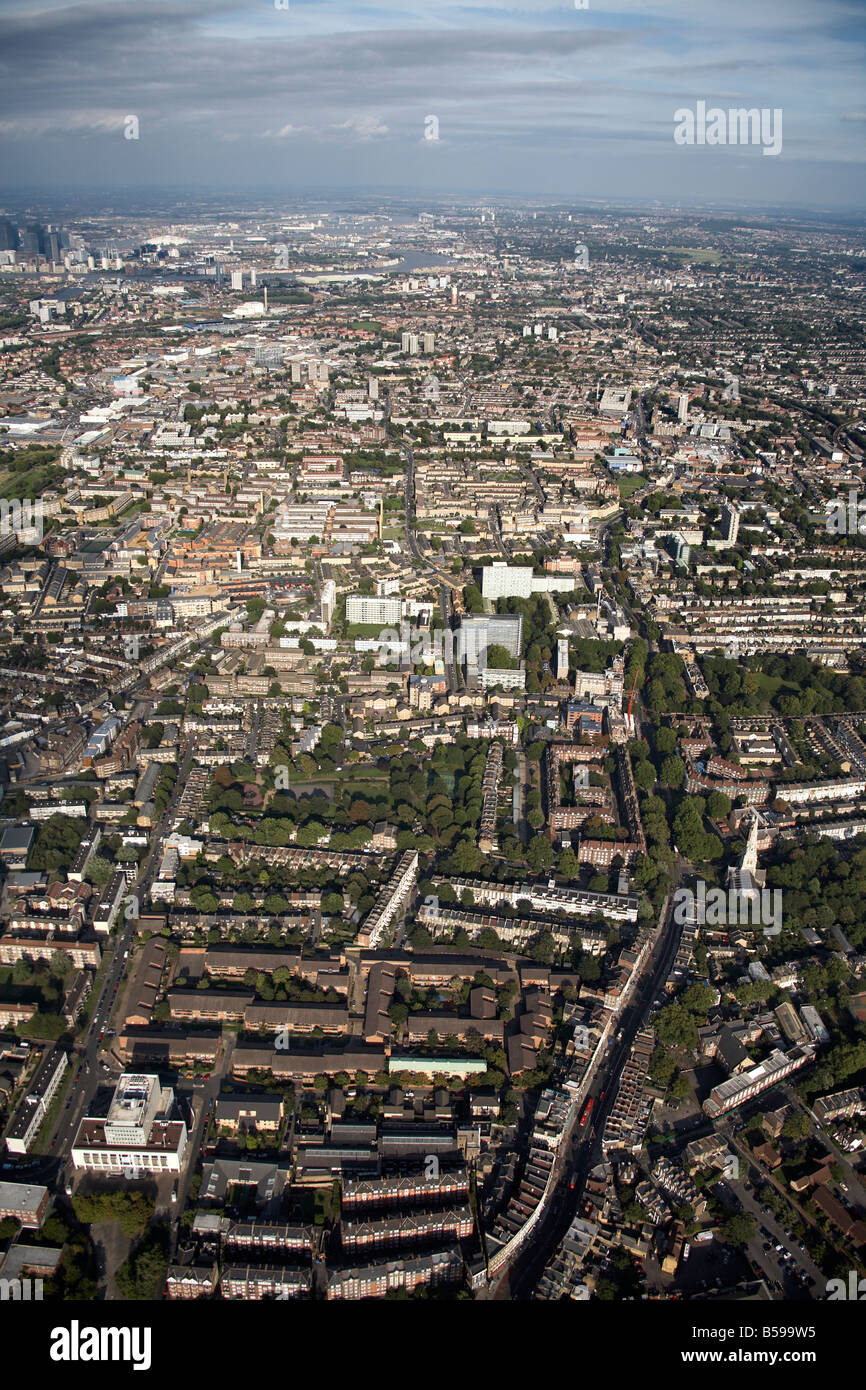 Aerial view north east of Rotherhithe Peckham and Deptford River Thames suburban houses tower blocks trees London SE16 SE15 SE8 Stock Photo