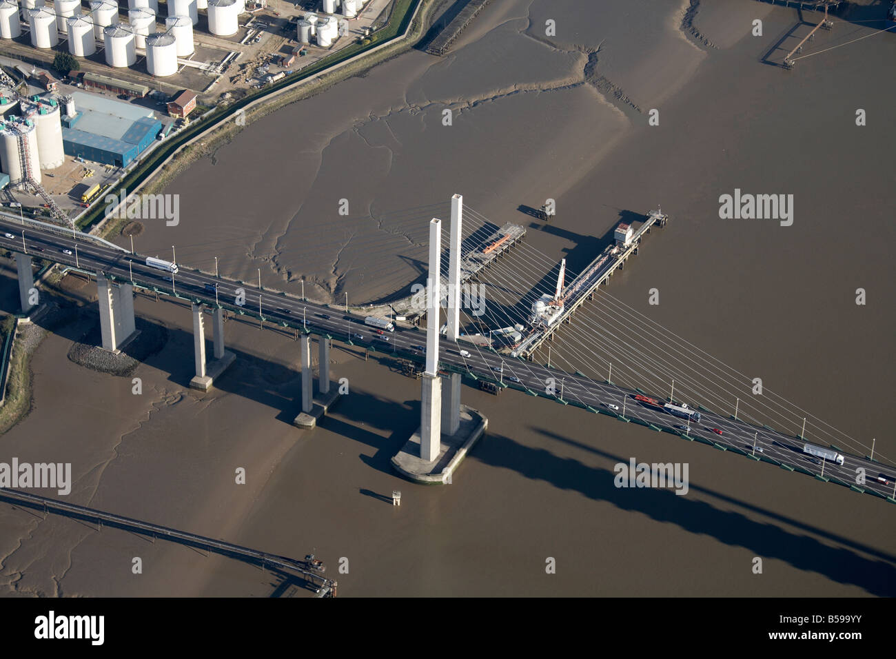 Aerial view south east of Queen Elizabeth II Bridge jetties River Thames oil storage depot West