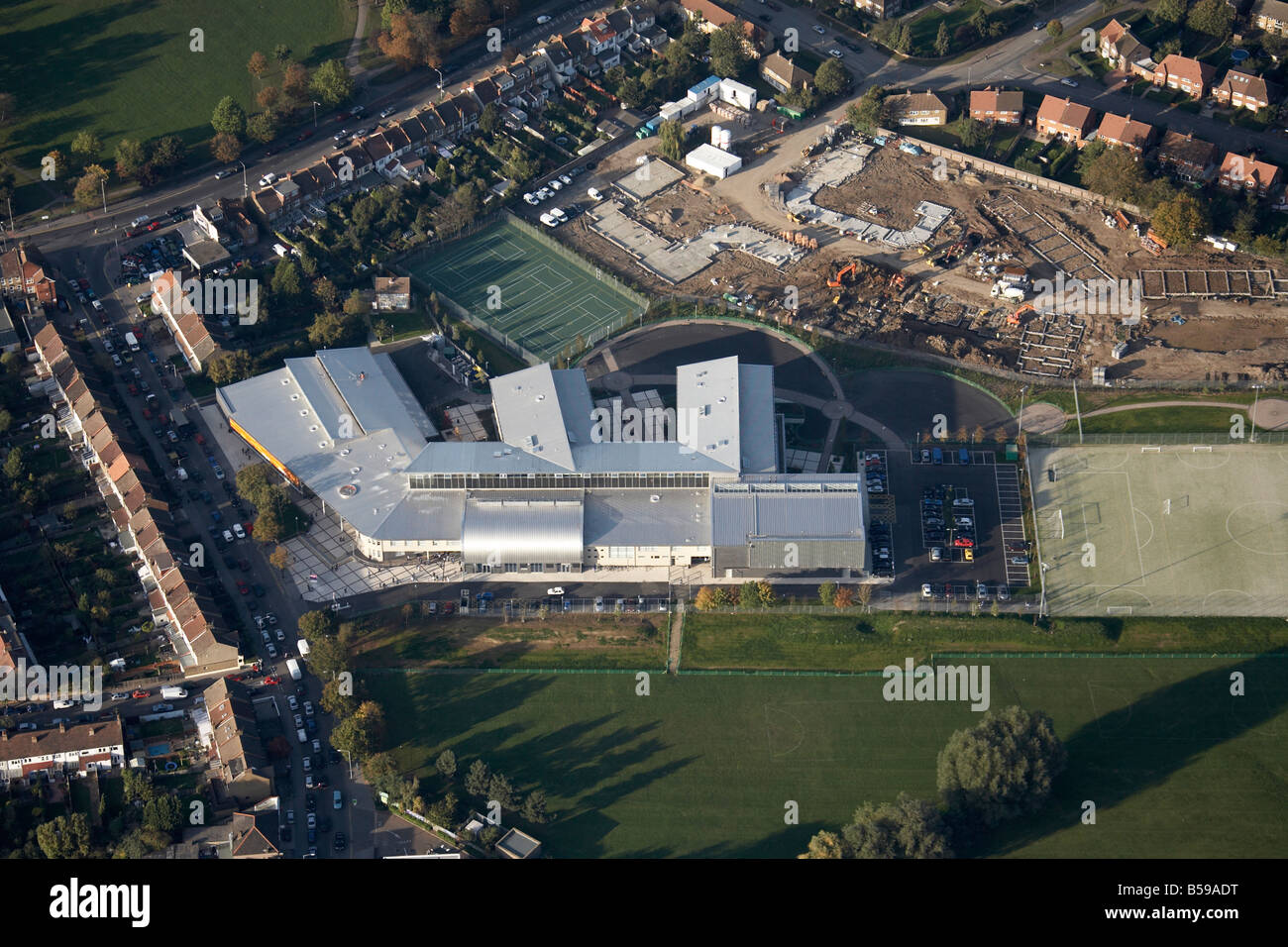 Aerial view north west of Ashburton Community School tennis courts Addiscombe Road Shirley Road construction work Croydon London Stock Photo