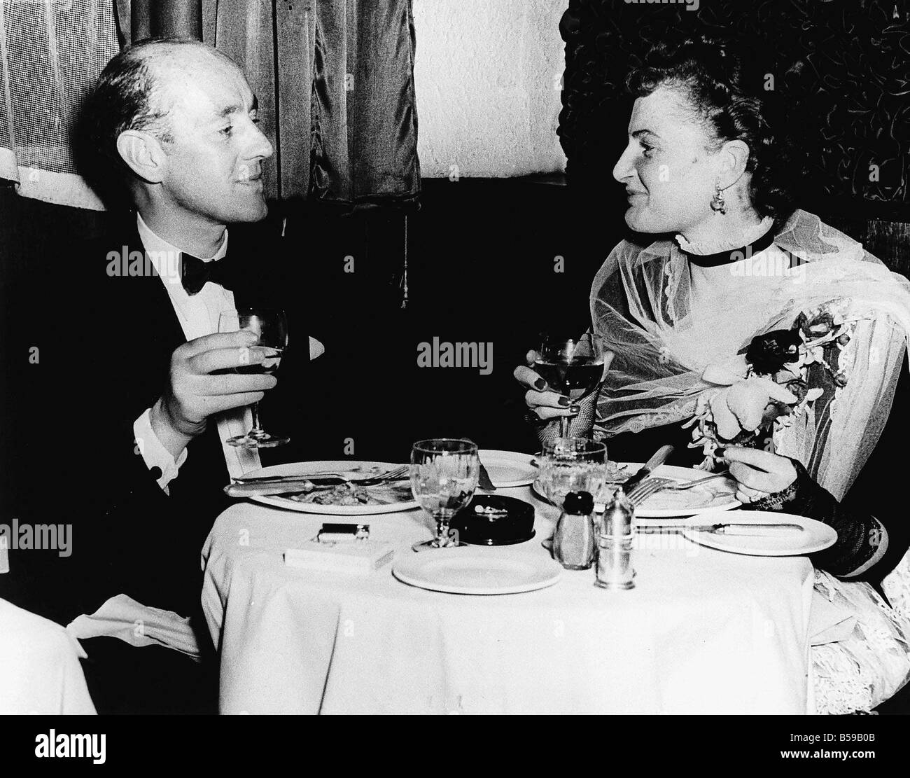 Alec Guinness Actor and his wife at Londons Caprice Club after the premiere of Oliver Twist in which Alec plays Fagin Stock Photo