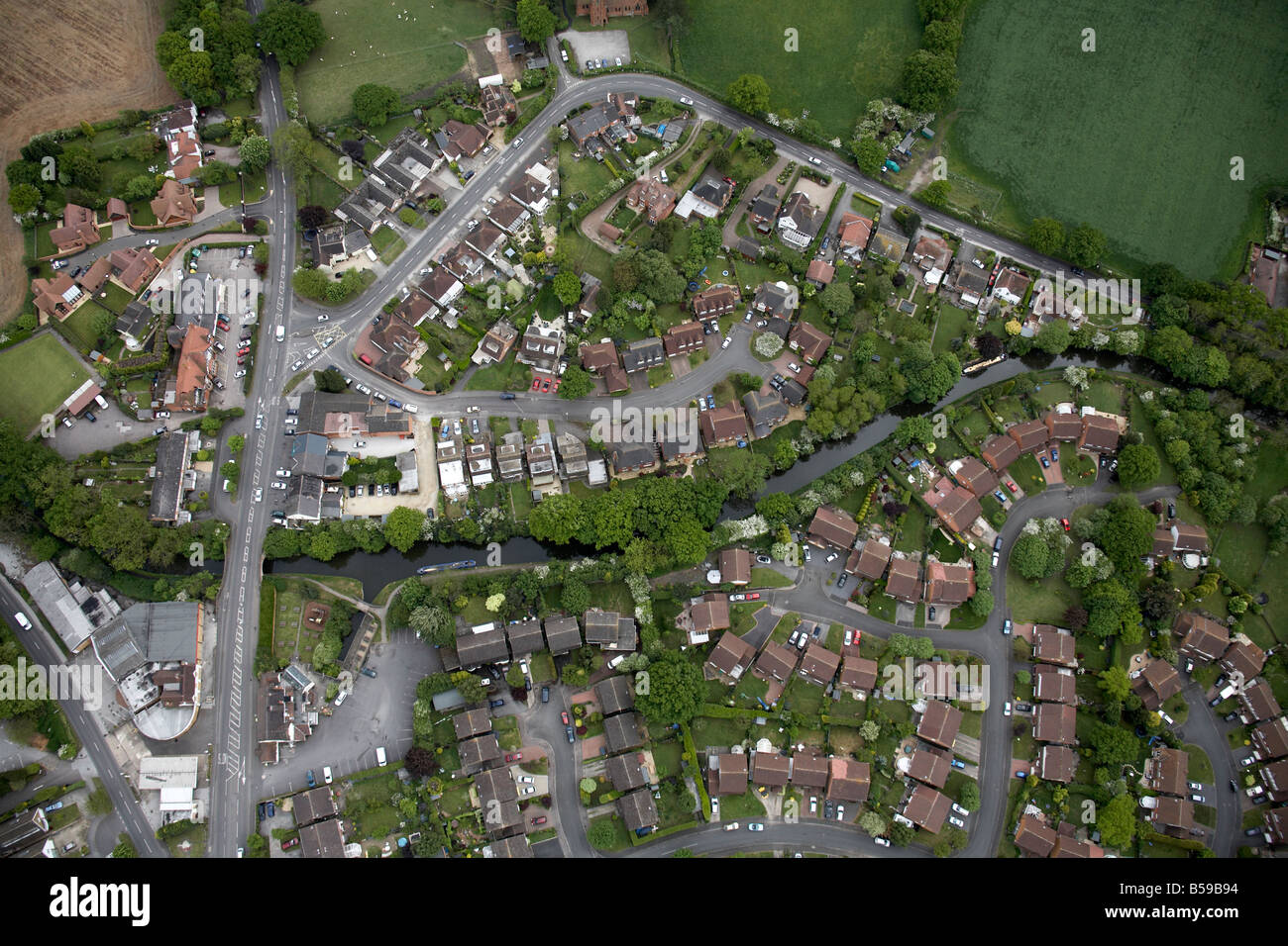 Aerial view south of canal suburban houses fields Stratford Road Spring