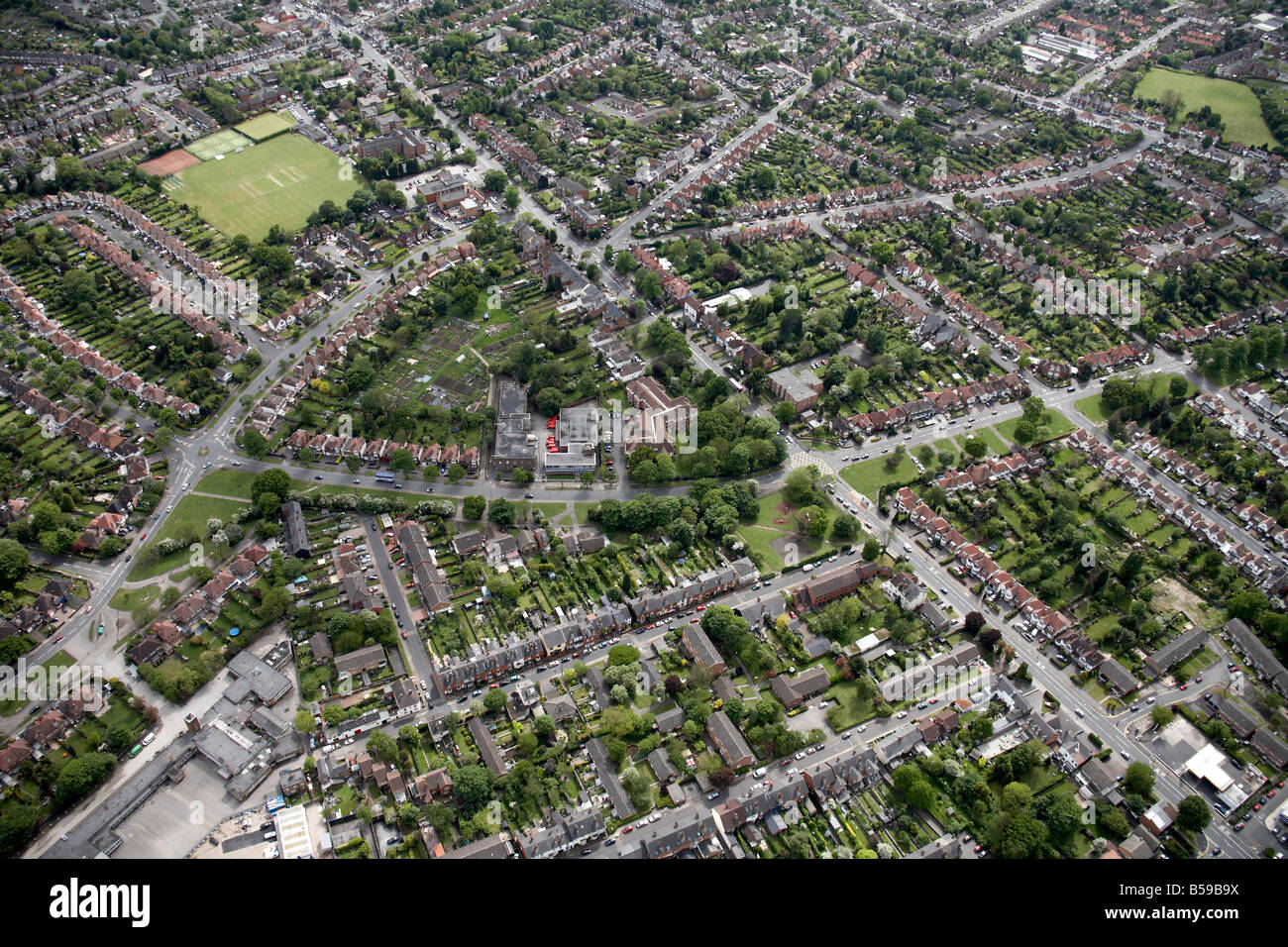 Aerial view south west of suburban houses sports fields Alcester Road