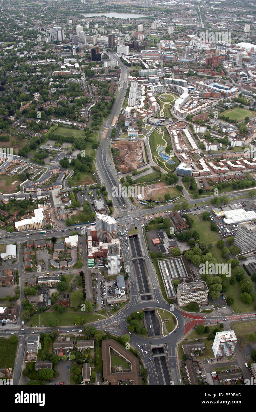 Aerial view north west of apartment blocks tower blocks sports fields Belgrave Lee Bank