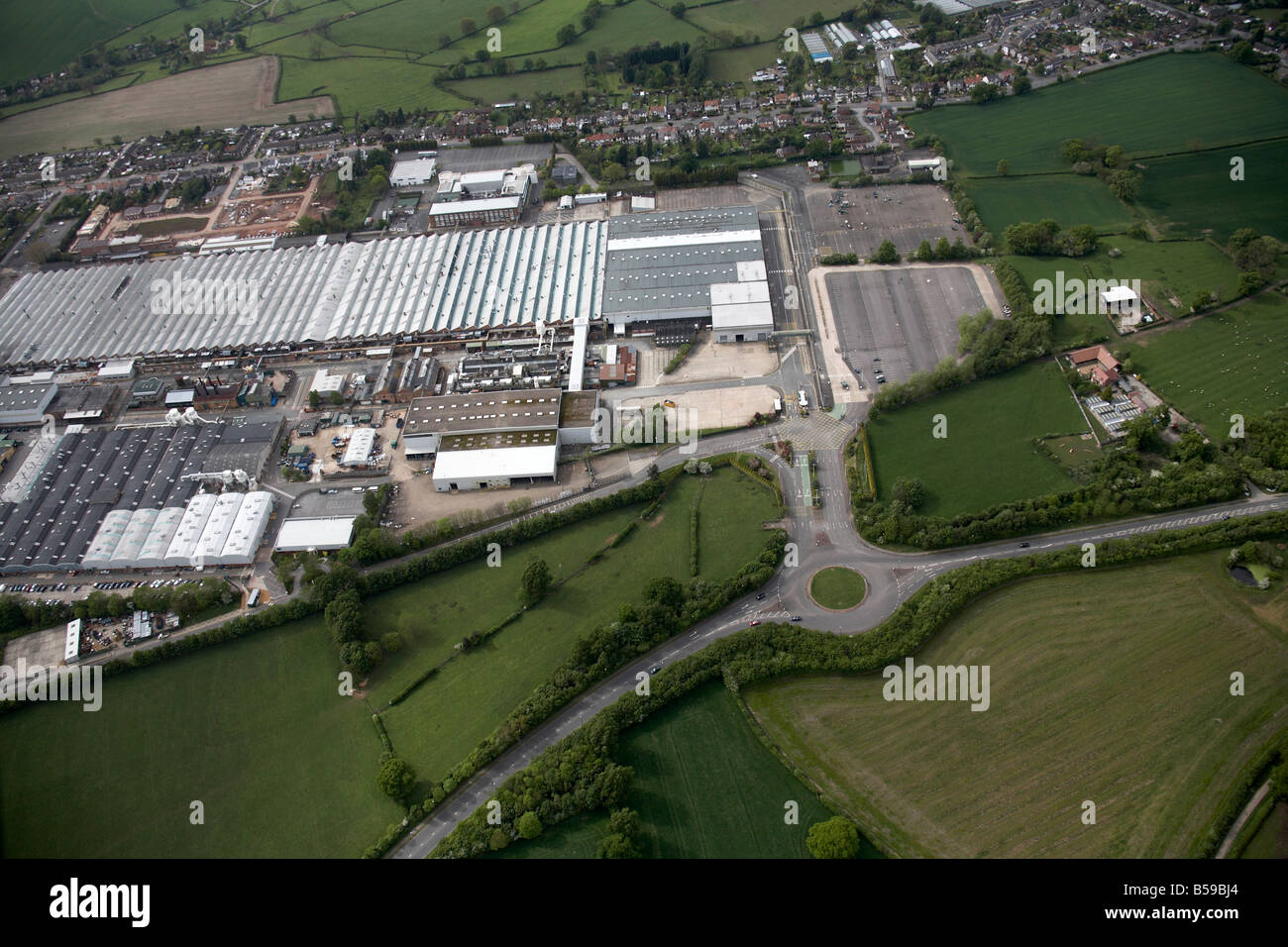Aerial View North West Of Jaguar Car Plant Coundon Wedge Drive Country Fields Suburban Houses Brown Lane Coventry Cv5 England Uk Aerial View North West Of Jaguar Car Plant Coundon Wedge Drive Country Fields Suburban Houses Brown Lane Coventry Cv5 England Uk