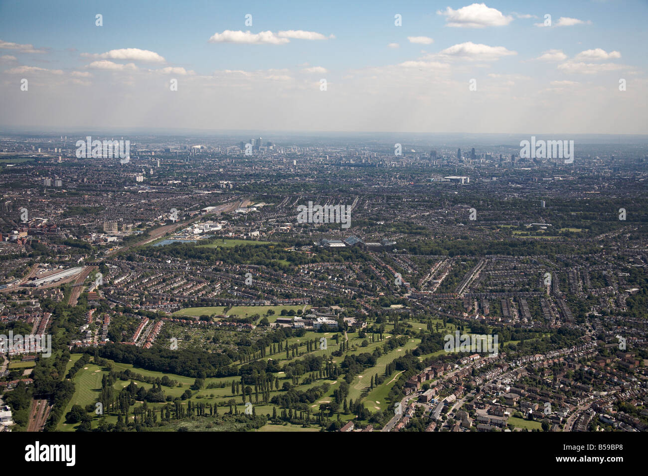 Aerial view south east of Muswell Hill Golf Course Alexandra Park suburban houses Wood Green Hornsey London N11 N10 N22 N8 Engla Stock Photo