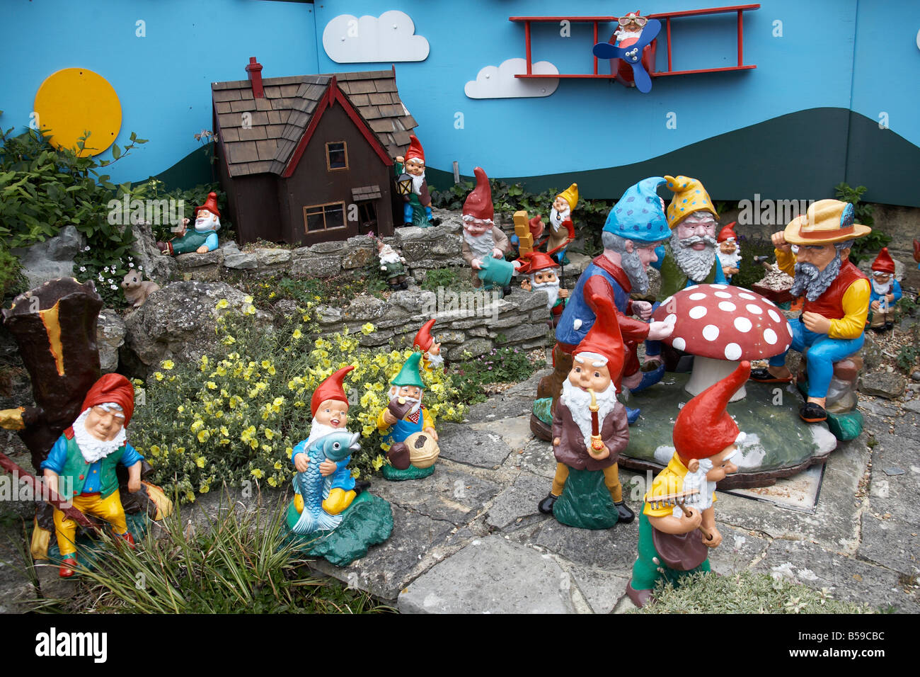 Garden gnome models in Blackgang Chine Fantasy Park Isle of Wight England UK Family and childrens visitor attraction Stock Photo