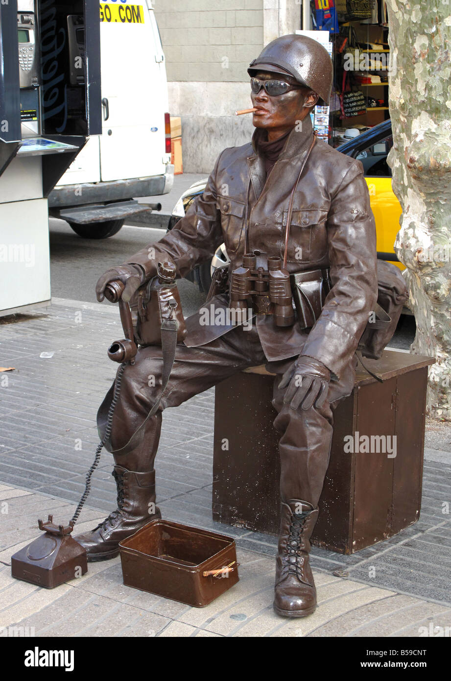 Street statue artist dressed as uniformed Japanese World War II communications soldier on La Rambla, Barcelona, Spain Stock Photo
