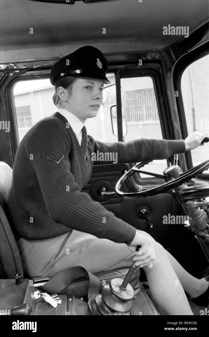 An Army girl in Germany learns to handle an army lorry instead of the usual Staff cars. April 1975 75-1939-014 Stock Photo