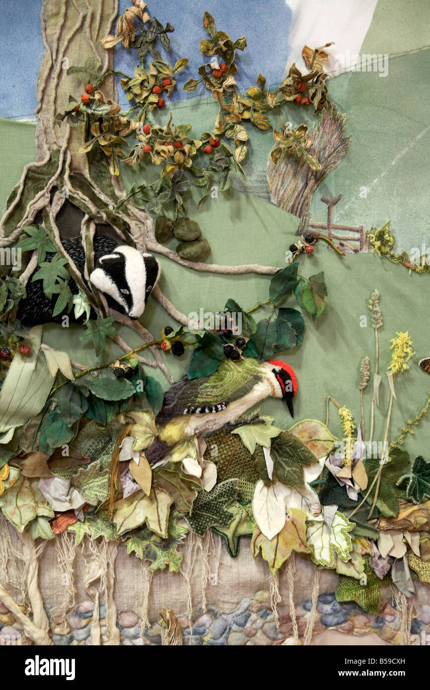 Rural countryside embroidery with woodpecker and Badger at Mottistone Manor NT Naational Trust Isle of Wight England UK Stock Photo