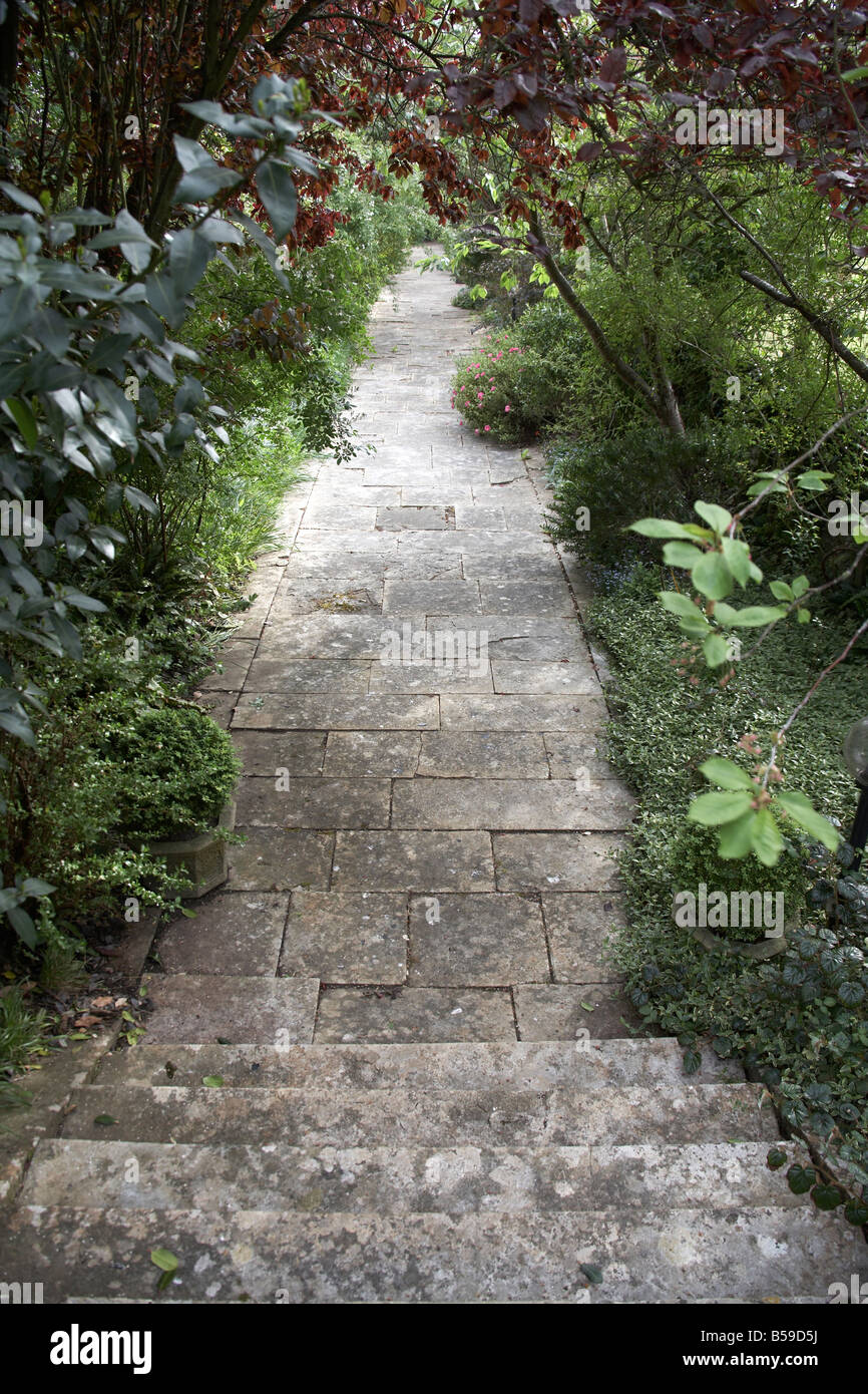 Garden path receding into the distance at Brook House Isle of Wight England UK Stock Photo