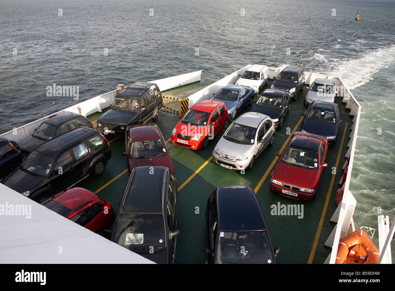 Cars parked on vehicle deck of Red Funnel ferry on the Solent England