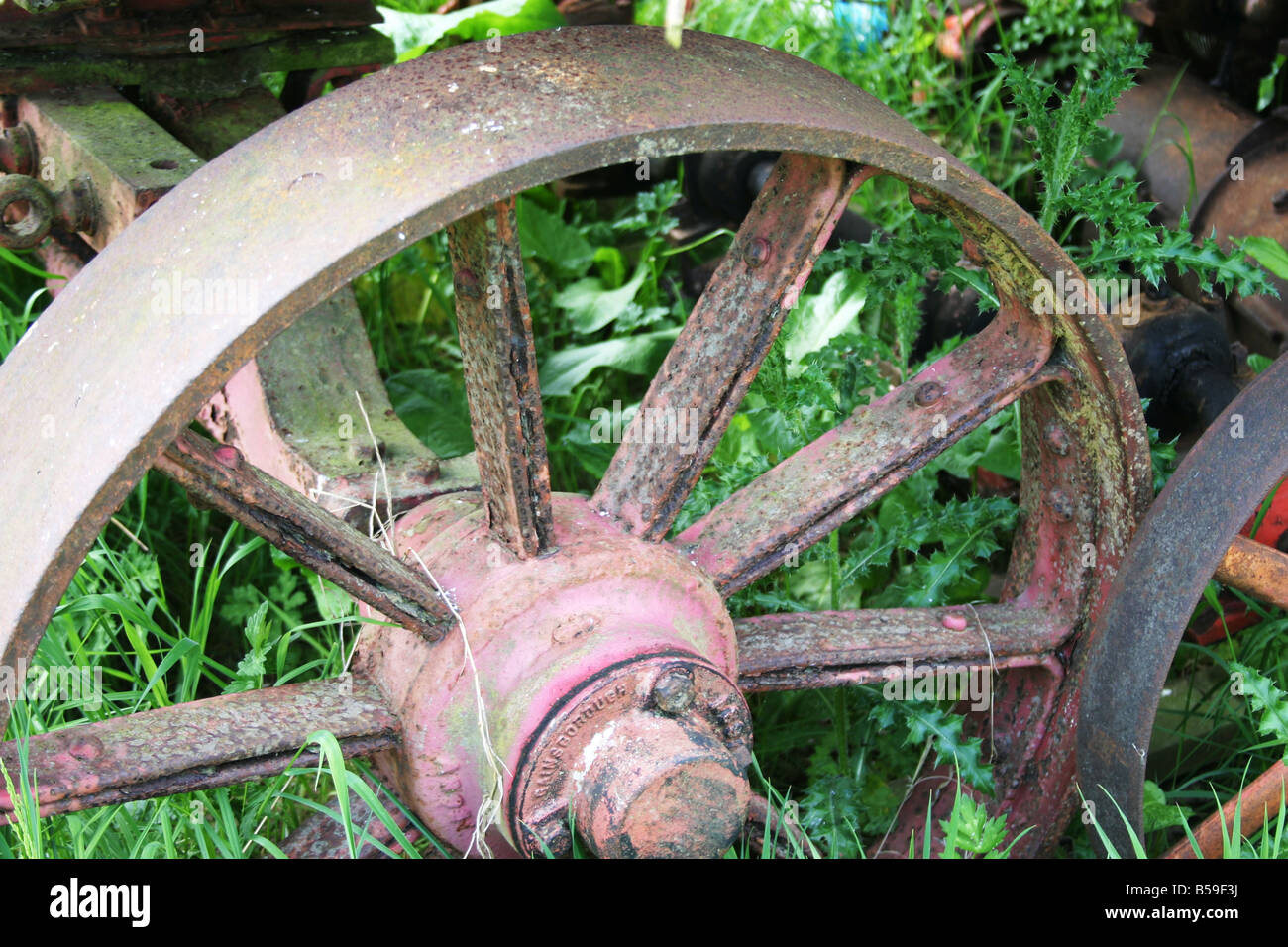 Old cast iron wheel Stock Photo Alamy