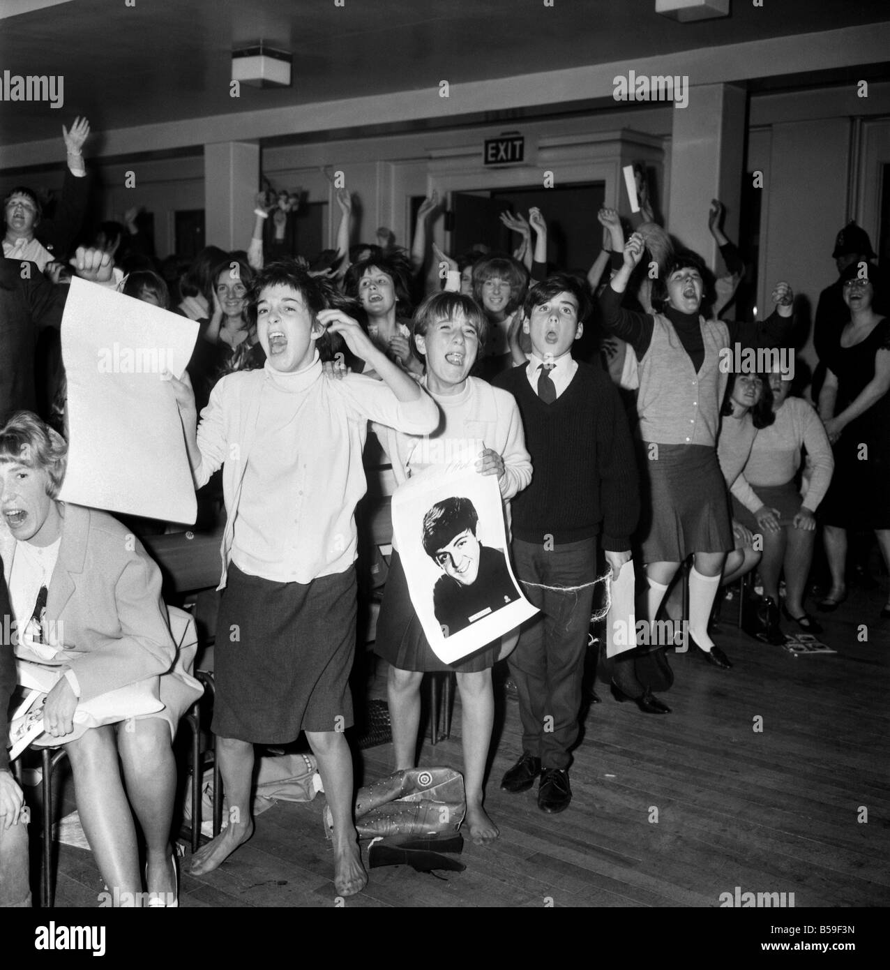 Screaming girl fans greet the Beatles last night on their appearance in ...