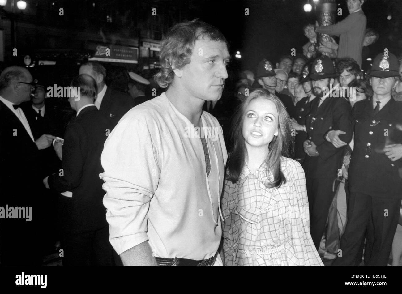 Premiere of the film 'Midnight Cowboy' ;Richard Harris escorting Ann Kristin into the theatre.  September 1969 ;Z09028-005 Stock Photo