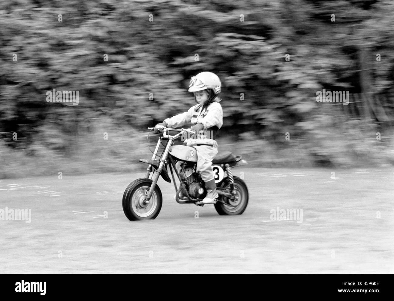 Children: Stunts: Mini-Motorbikes Speed Kids. August 1977 77-04293-007 Stock Photo