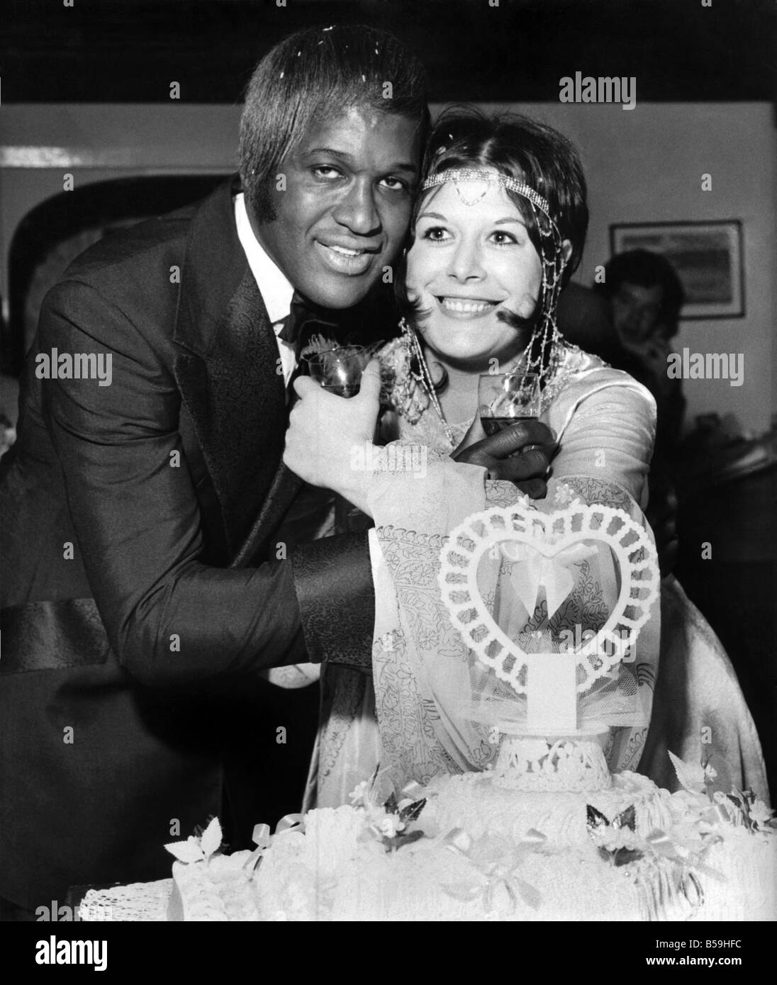 Singer Lovelace Watkin seen embracing his new bride Anna Maria Fitzsimmons who is expecting Lovelaces baby in three weeksMar. 19 Stock Photo