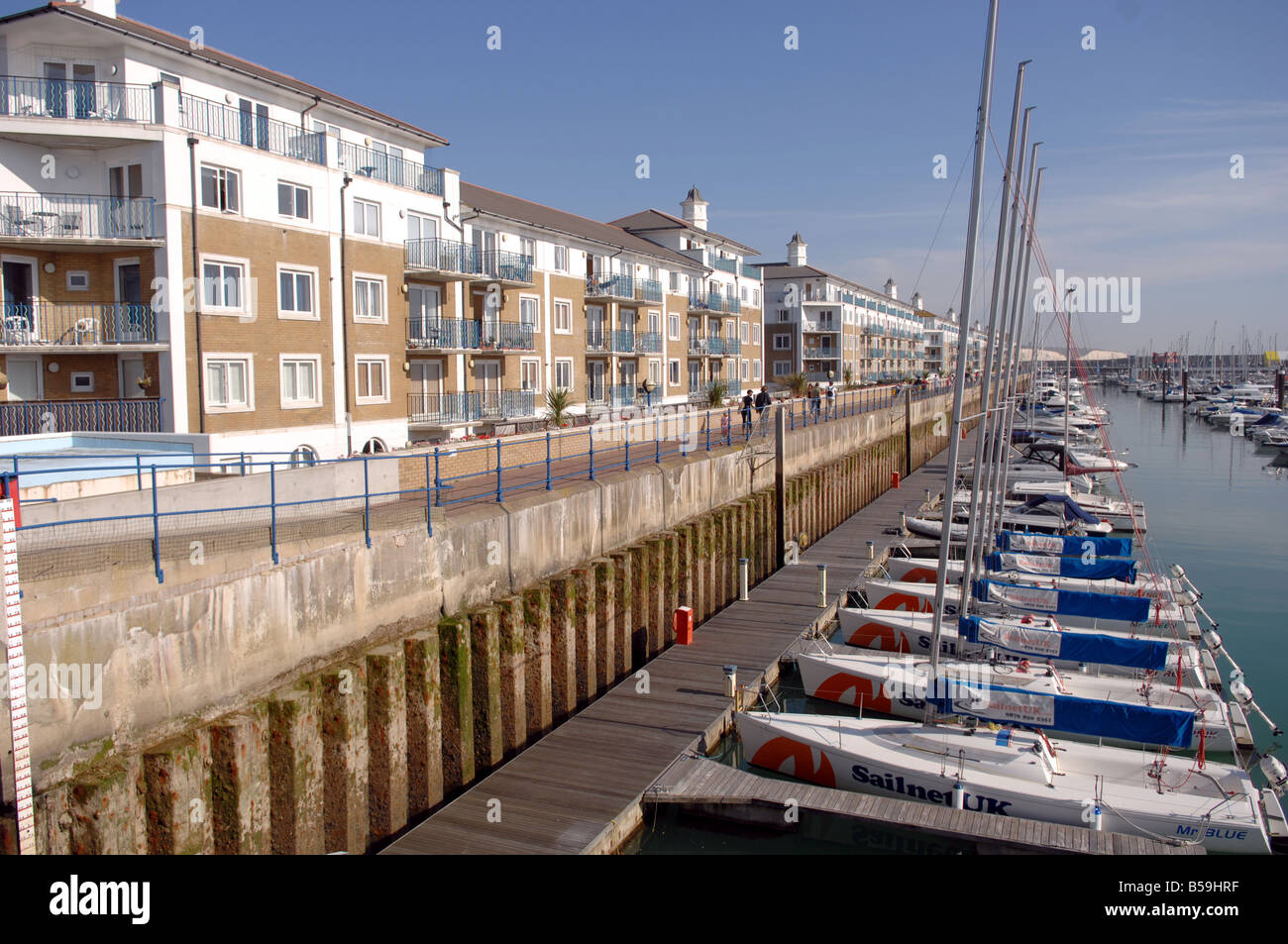 Waterfront flats and appartments overlooking moored yachts in Brighton Marina October 2008 Stock Photo