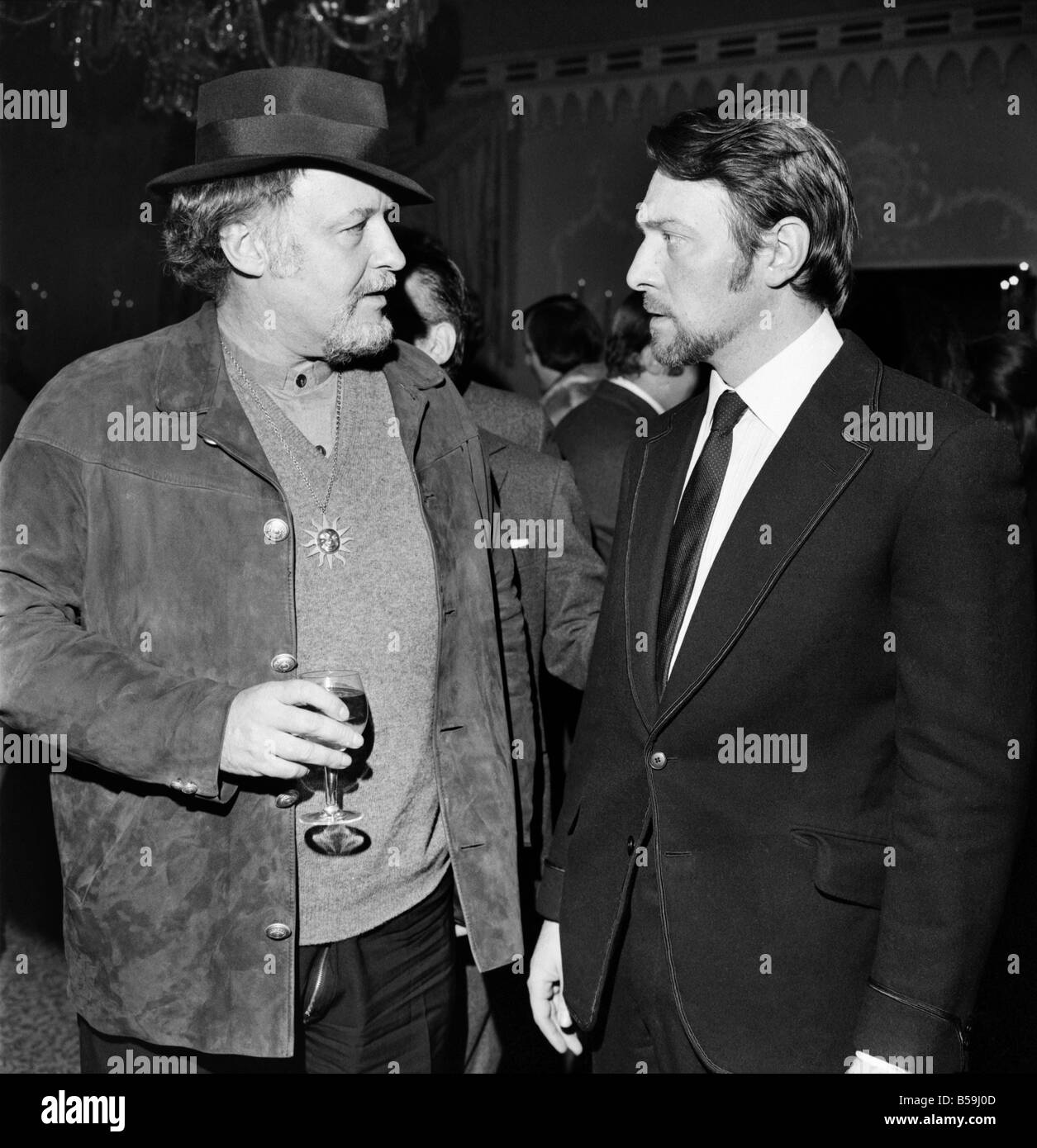 A new film by Columbia called ' Waterloo' in which Rod Steiger plays Napolean and actor Christopher Plummer plays The Duke Of Wellington had its press reception at the Dorchester Hotel. Rod Steiger, Left and Christopher Plummer chatting at the Dorchester during a press reception. February 1970 70-1695-002 Stock Photo