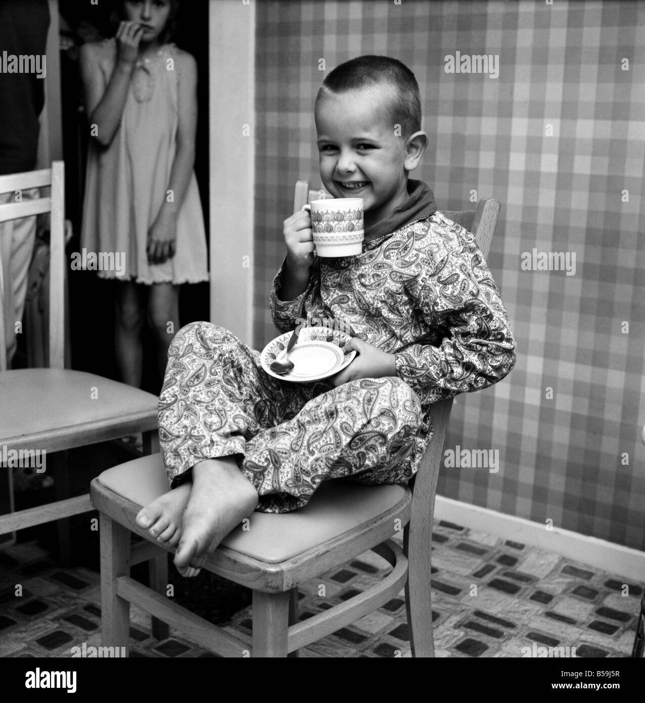 Humour Unusual Boy trapped in fridge. July 1970 706760002 Stock Photo Alamy